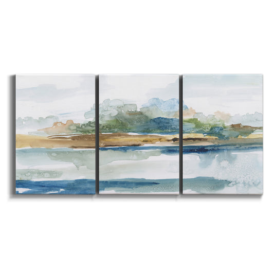 Three-panel canvas wall art featuring flowing blue abstract watercolor on white background.