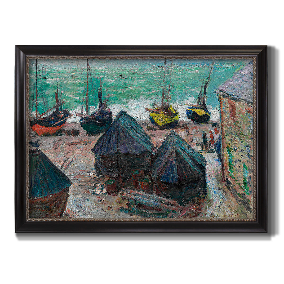 Impressionist coastal beach scene with boats by Claude Monet printed on canvas in an ornate black frame with gilded inner detail.