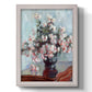 Impressionist chrysanthemum floral painting by Claude Monet printed on canvas in an ornate champagne frame with a vertical orientation.