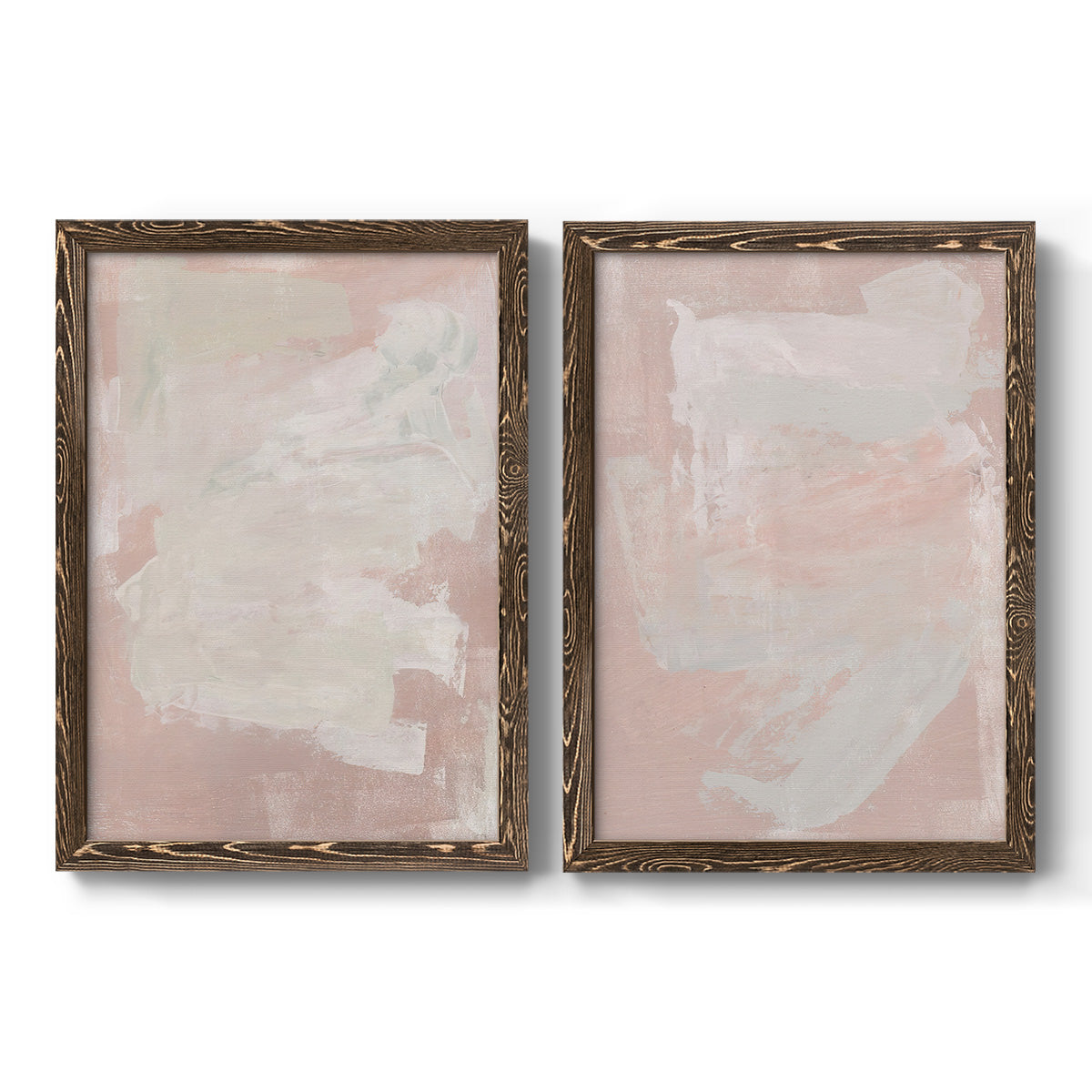Set of two walnut barnwood framed canvas prints featuring two minimalist color-field abstracts featuring soft blush and white painterly fields.