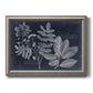 Antique botanical foliage artwork on navy background printed on canvas in an ornate vintage silver frame.