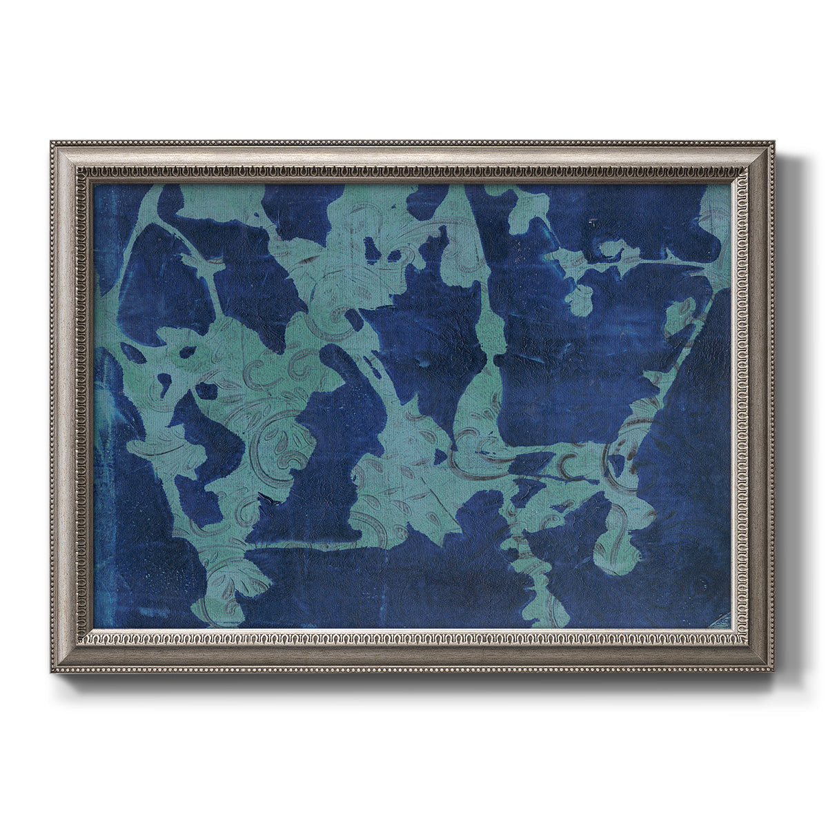 Blue abstract botanical printed on canvas in an ornate vintage silver frame.