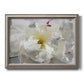 Close up view of peony petals printed on canvas in an ornate vintage silver frame.