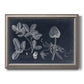 Antique botanical foliage illustration on navy background printed on canvas in an ornate vintage silver frame.