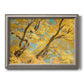 Vibrant yellow autumn leaves on branches printed on canvas in an ornate vintage silver frame.