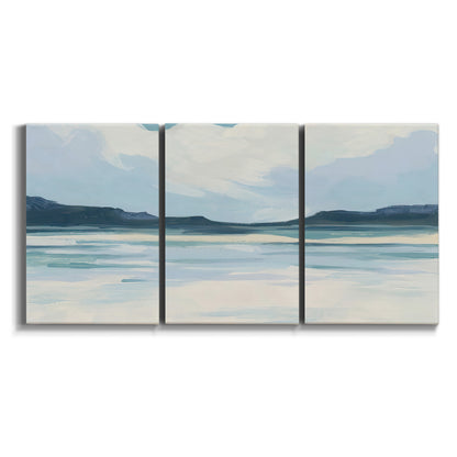 Three-panel canvas wall art featuring soft coastal shoreline landscape on white background.