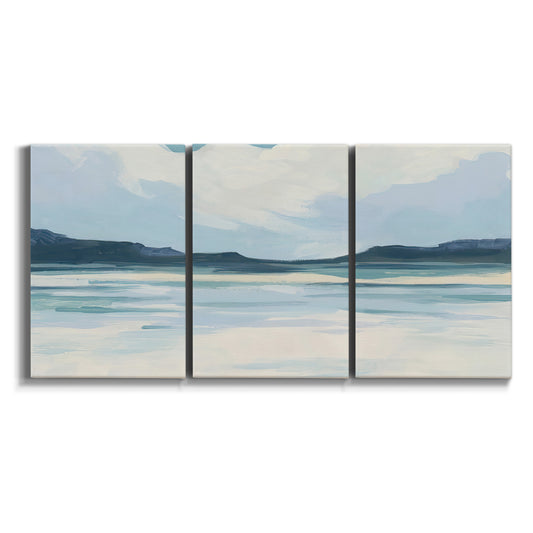 Three-panel canvas wall art featuring soft coastal shoreline landscape on white background.