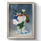 Impressionist floral still life painting by Claude Monet printed on canvas in an ornate black frame with gilded inner detail with a vertical orientation.