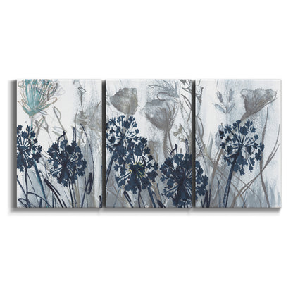 Three-panel canvas wall art featuring indigo floral abstraction on white background.