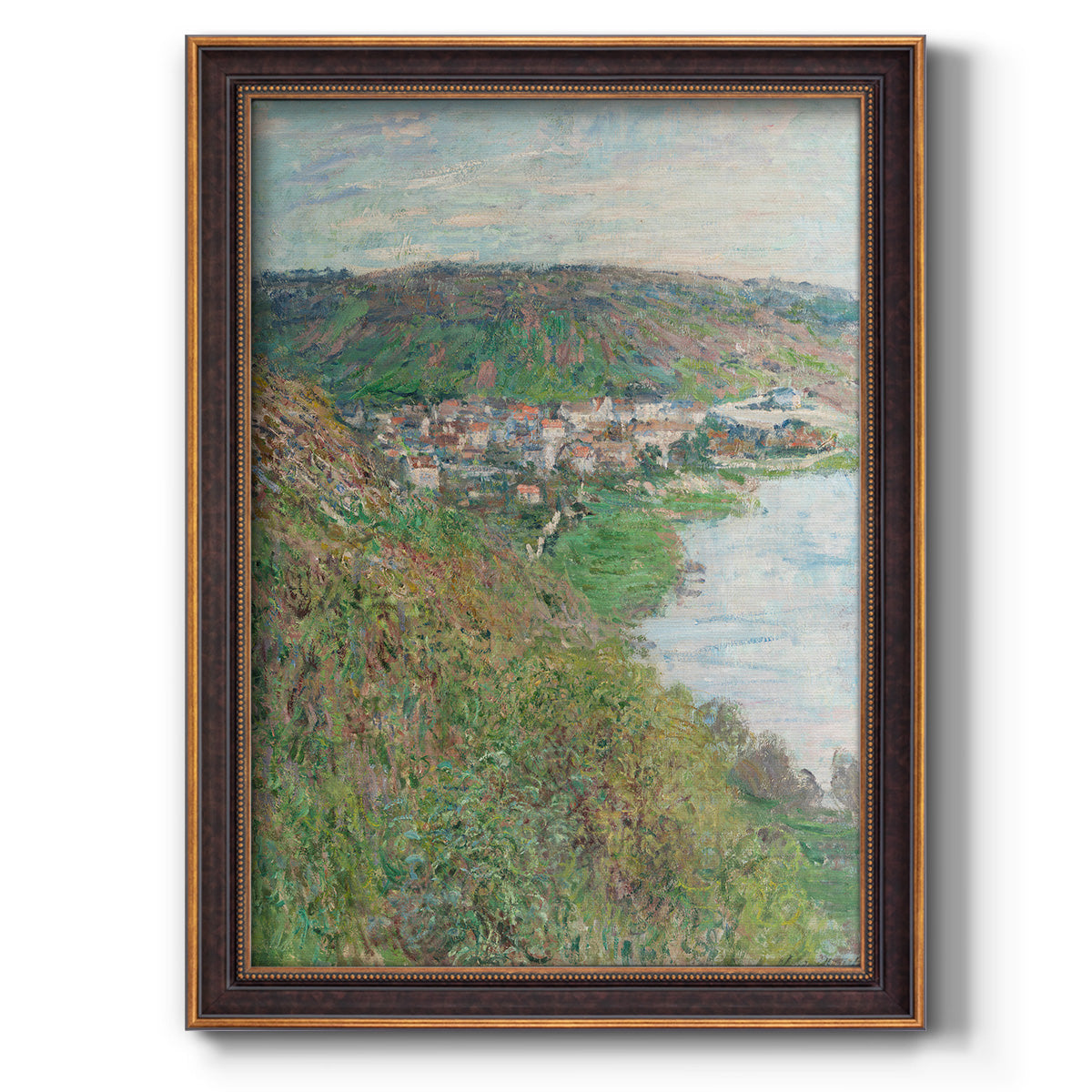 Impressionist landscape view of Vétheuil by Claude Monet printed on canvas in an ornate bronzed mahogany wood frame with a vertical orientation.