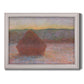 Impressionist haystack sunset scene in winter by Claude Monet printed on canvas in an ornate weathered white frame.