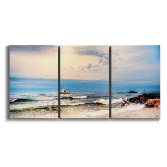 Three-panel canvas wall art featuring boats heading toward open sea on white background.
