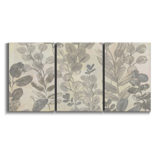 Three-panel canvas wall art featuring repeating leaf botanical pattern on white background.