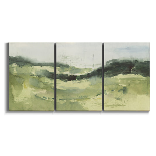 Three-panel canvas wall art featuring rolling hillside countryside landscape on white background.