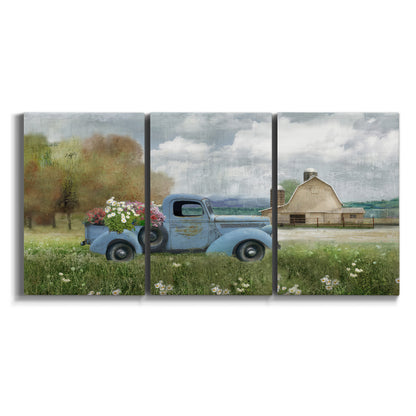 Three-panel canvas wall art featuring vintage blue truck with flower load on white background.