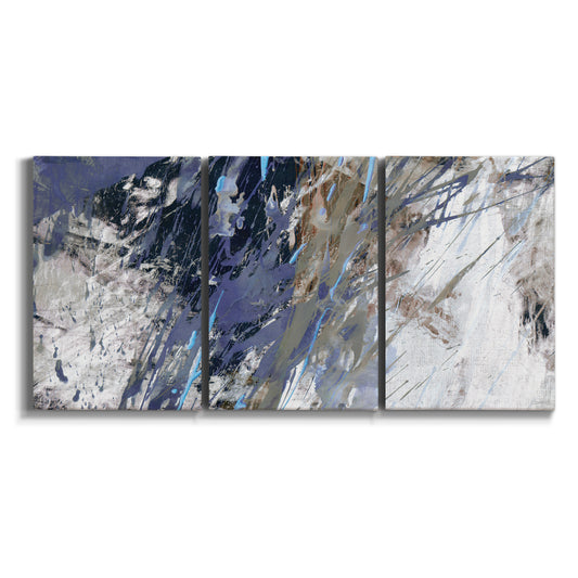 Three-panel canvas wall art featuring textured blue abstract composition on white background.