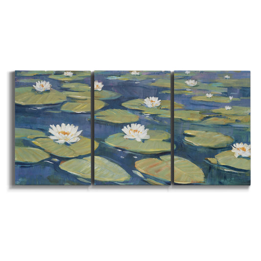 Three-panel canvas wall art featuring water lilies floating on pond on white background.