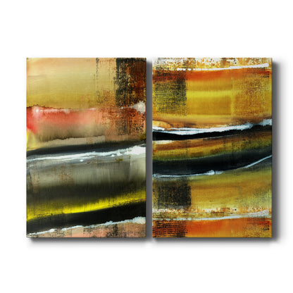 Set of two vertical canvas prints featuring warm-toned abstract desert landscape artwork, displayed side by side.
