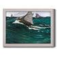 Impressionist seascape with crashing green wave by Claude Monet printed on canvas in an ornate weathered white frame.