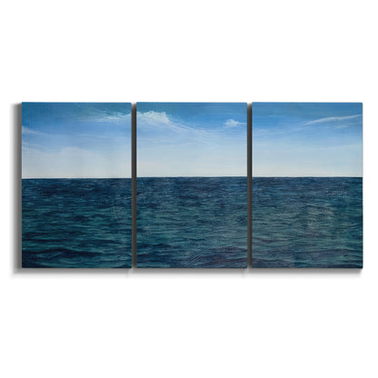 Three-panel canvas wall art featuring open water landscape with wide horizon on white background.