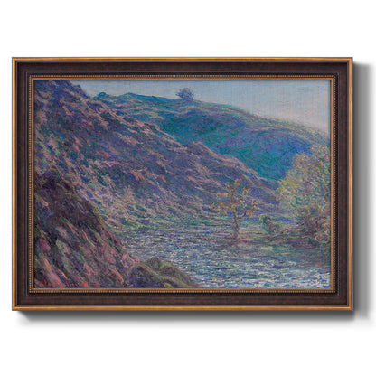 Impressionist river valley landscape by Claude Monet printed on canvas in an ornate bronzed mahogany wood frame.