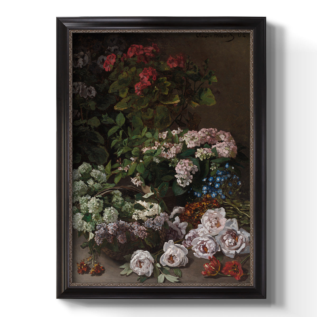 Early impressionist floral painting by Claude Monet printed on canvas in an ornate black frame with gilded inner detail with a vertical orientation.