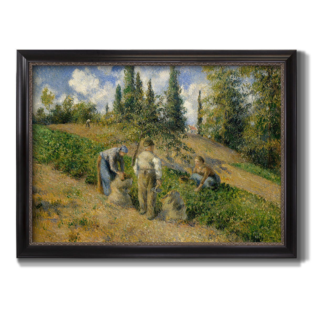 Impressionist countryside harvest scene by Camille Pissarro printed on canvas in an ornate black frame with gilded inner detail.