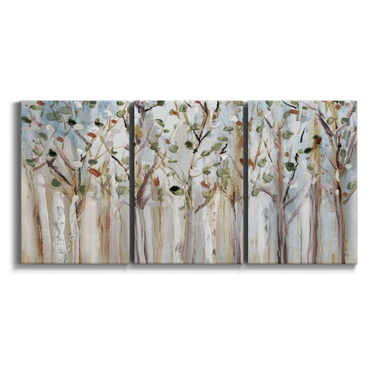 Three-panel canvas wall art featuring bare birch trees in winter forest on white background.
