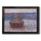 Impressionist single haystack landscape by Claude Monet printed on canvas in an ornate black frame with gilded inner detail.