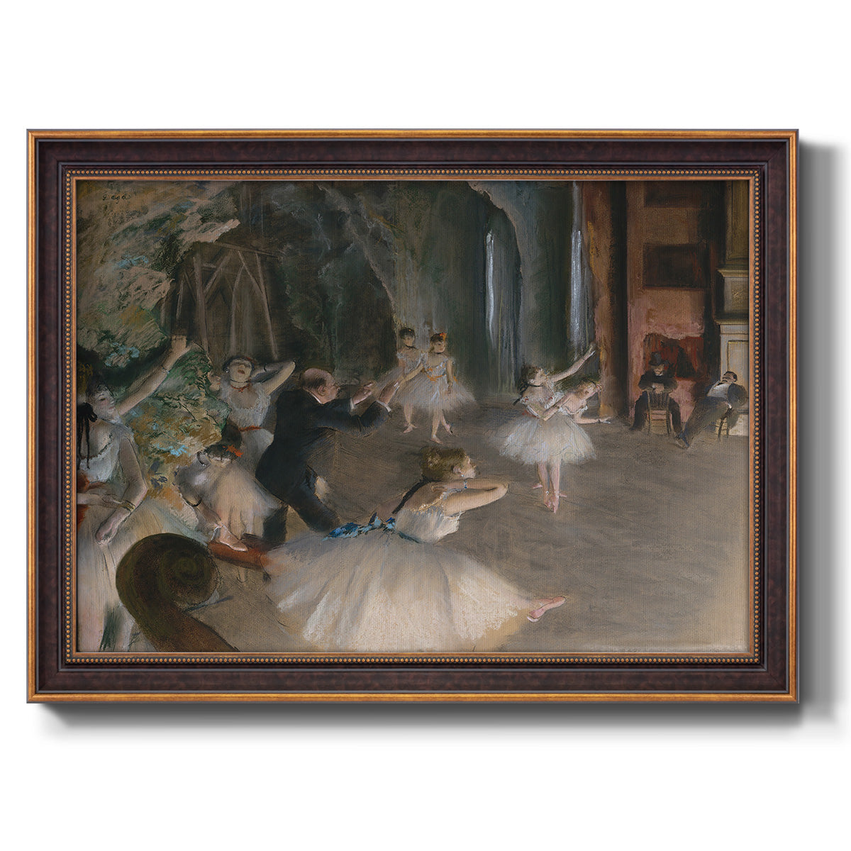 Impressionist backstage ballet scene by Edgar Degas printed on canvas in an ornate bronzed mahogany wood frame.