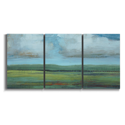 Three-panel canvas wall art featuring wide valley landscape with rolling hills on white background.