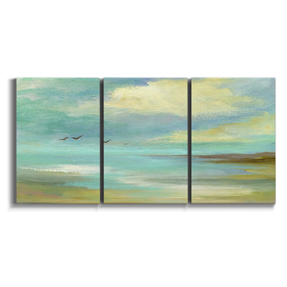 Three-panel canvas wall art featuring calm coastal drift patterns on white background.