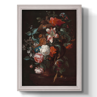 Classical floral still life painting by Jan van Huysum printed on canvas in an ornate champagne frame with a vertical orientation.