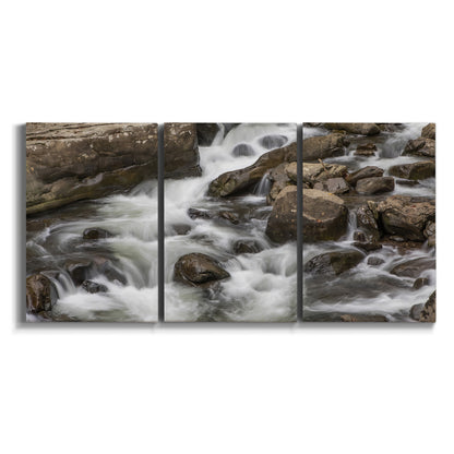 Three-panel canvas wall art featuring rushing river water over rocks on white background.