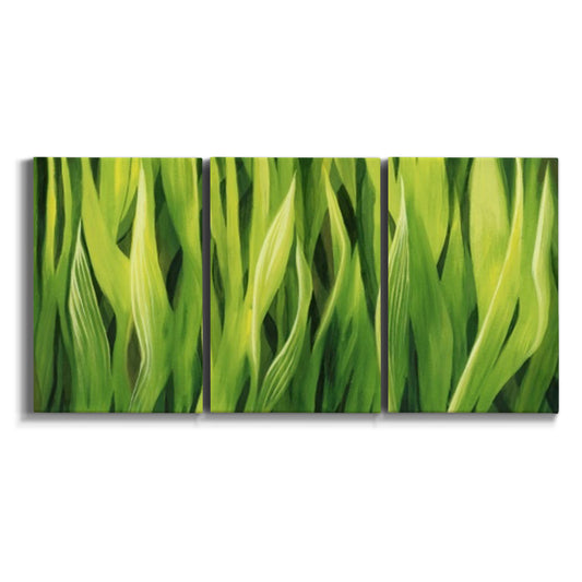 Three-panel canvas wall art featuring close view of tall green grass blades on white background.