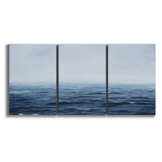 Three-panel canvas wall art featuring grayscale seascape with horizon on white background.