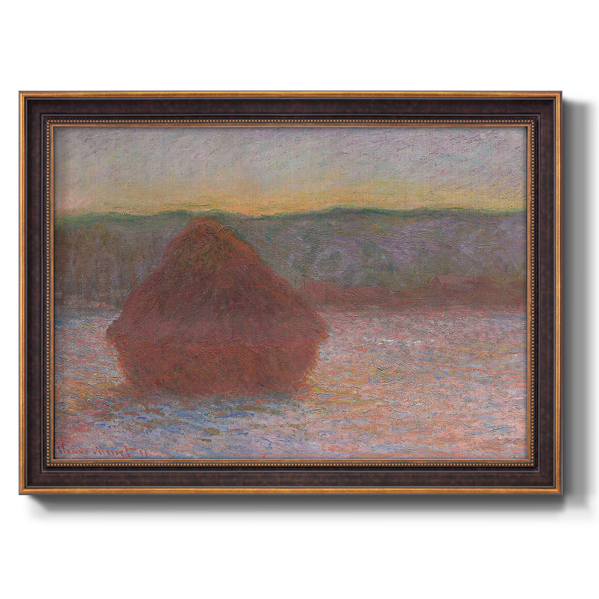 Impressionist haystack sunset scene in winter by Claude Monet printed on canvas in an ornate bronzed mahogany wood frame.