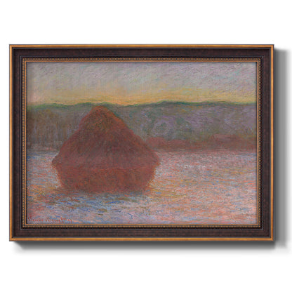 Impressionist haystack sunset scene in winter by Claude Monet printed on canvas in an ornate bronzed mahogany wood frame.