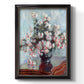 Impressionist chrysanthemum floral painting by Claude Monet printed on canvas in an ornate bronzed mahogany wood frame with a vertical orientation.