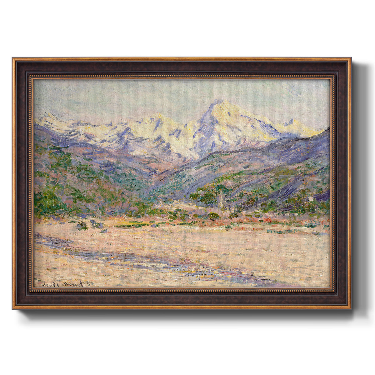 Impressionist valley landscape in southern France by Claude Monet printed on canvas in an ornate bronzed mahogany wood frame.