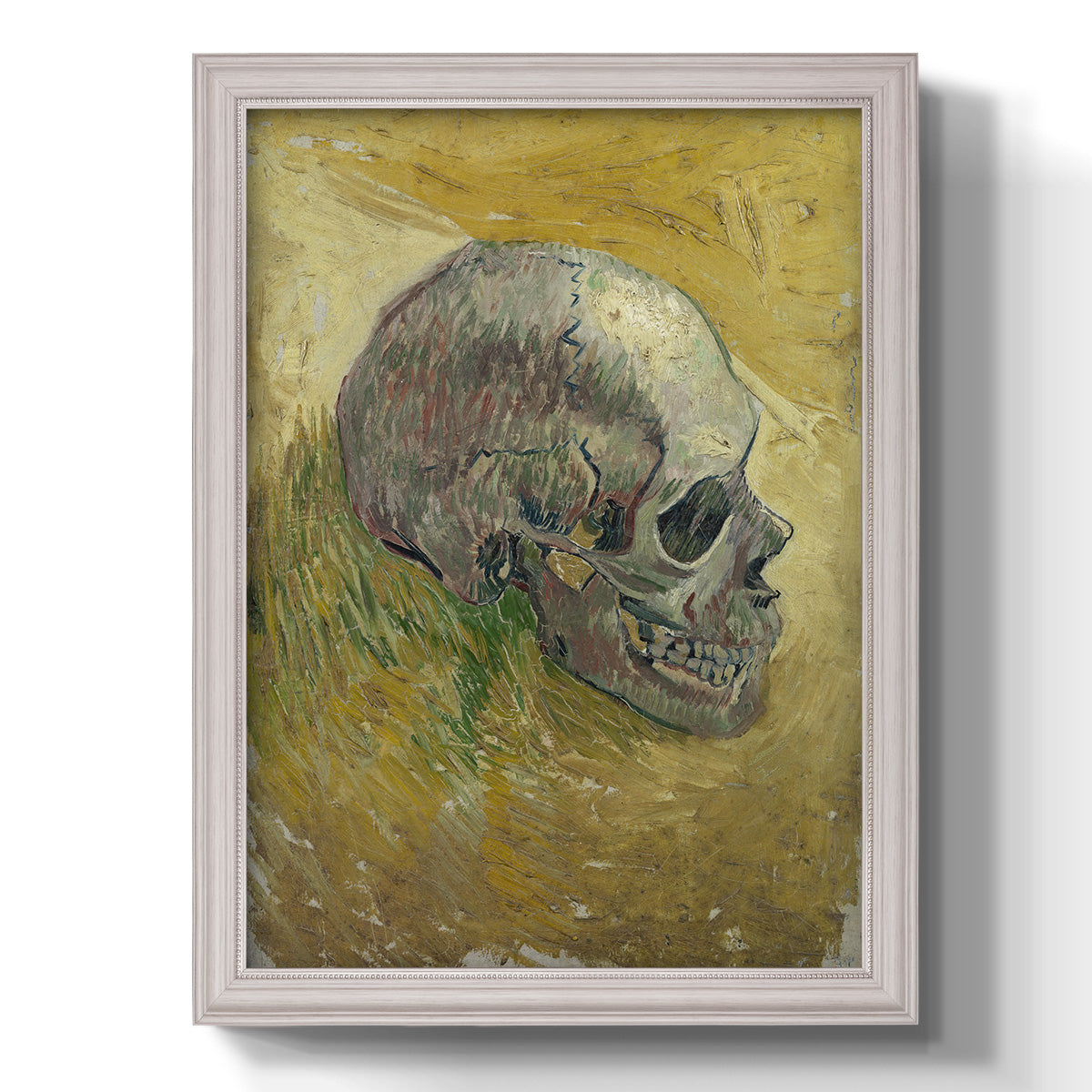 Profile skull study artwork by Vincent van Gogh printed on canvas in an ornate champagne frame with a vertical orientation.