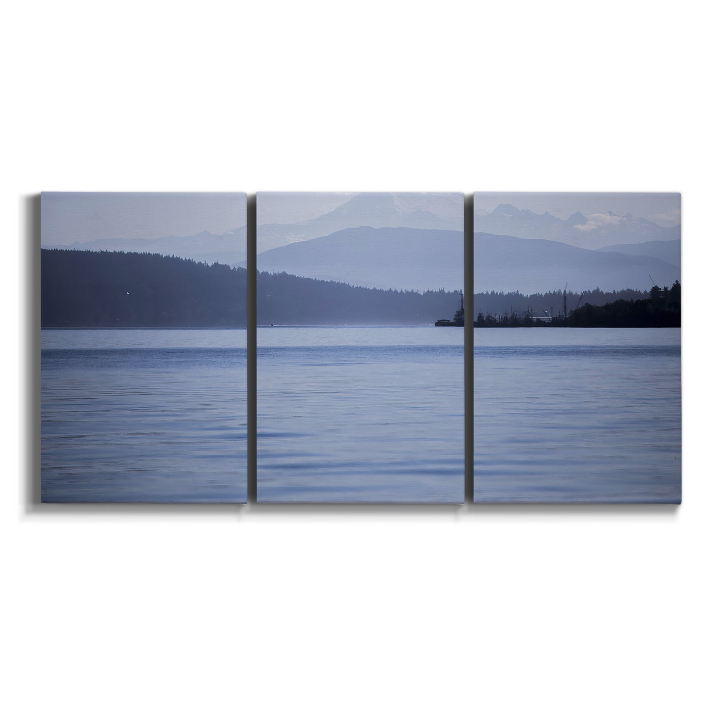 Three-panel canvas wall art featuring calm blue water landscape on white background.