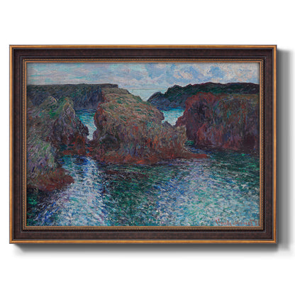 Impressionist rocky seascape by Claude Monet printed on canvas in an ornate bronzed mahogany wood frame.