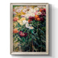 Impressionist garden floral painting by Gustave Caillebotte printed on canvas in an ornate black frame with gilded inner detail with a vertical orientation.