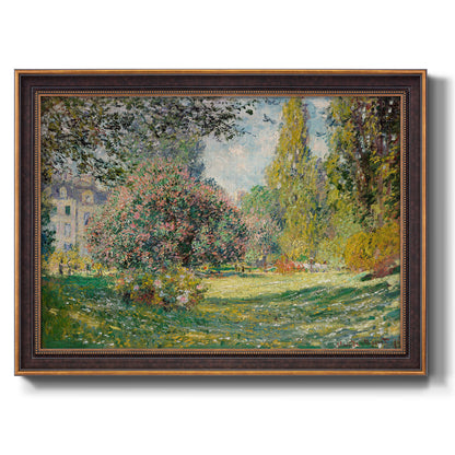 Impressionist park landscape in Paris by Claude Monet printed on canvas in an ornate bronzed mahogany wood frame.
