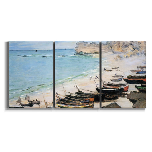 Three-panel canvas wall art featuring rocky beach beneath cliffs on white background.