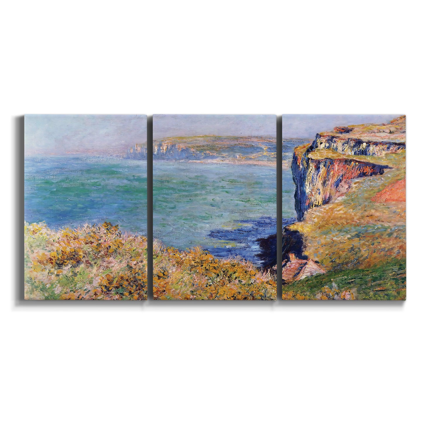 Three-panel canvas wall art featuring coastal village view near dieppe on white background.