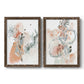 Set of two walnut barnwood framed canvas prints featuring two abstract watercolor botanicals featuring loose blush gray and coral floral gestures.