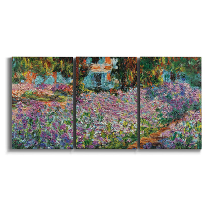 Three-panel canvas wall art featuring blooming irises in garden bed on white background.