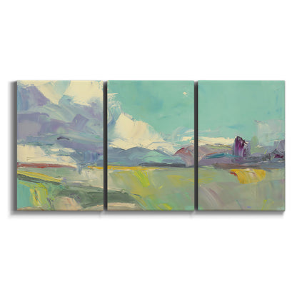 Three-panel canvas wall art featuring road stretching through open countryside on white background.